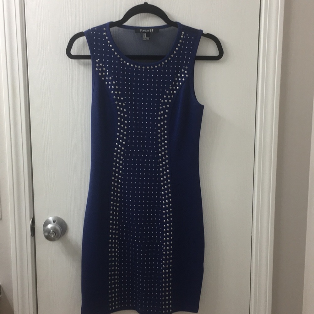 Blue bodycon with sequins and sheer back.